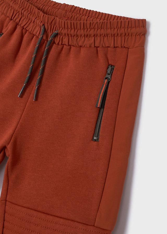detail Long sweatpants reinforced on the knees for a boy