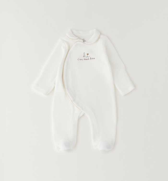 detail Unisex kojenecký overal s chodidly IDO