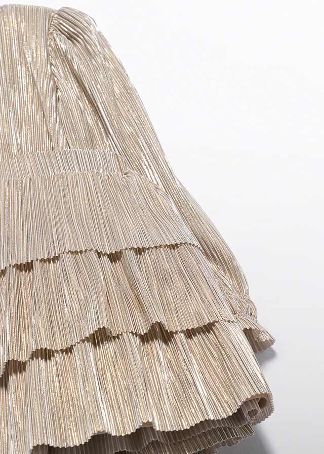 detail Dívčí pletený set s plisovanou sukní v zlatém odstínu ABEL & LULA